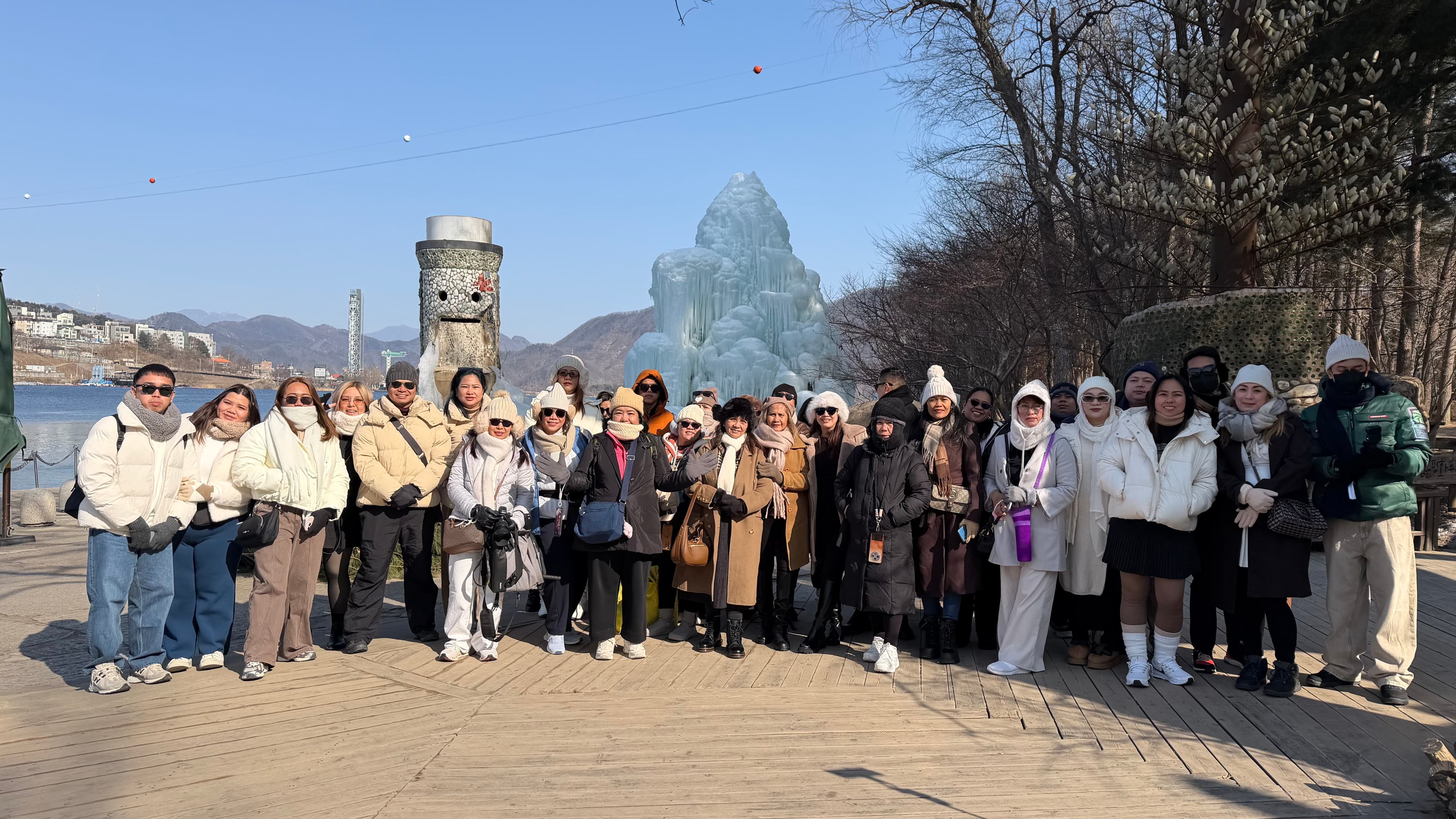 World Master International Travel group in winter coats at Nami Island